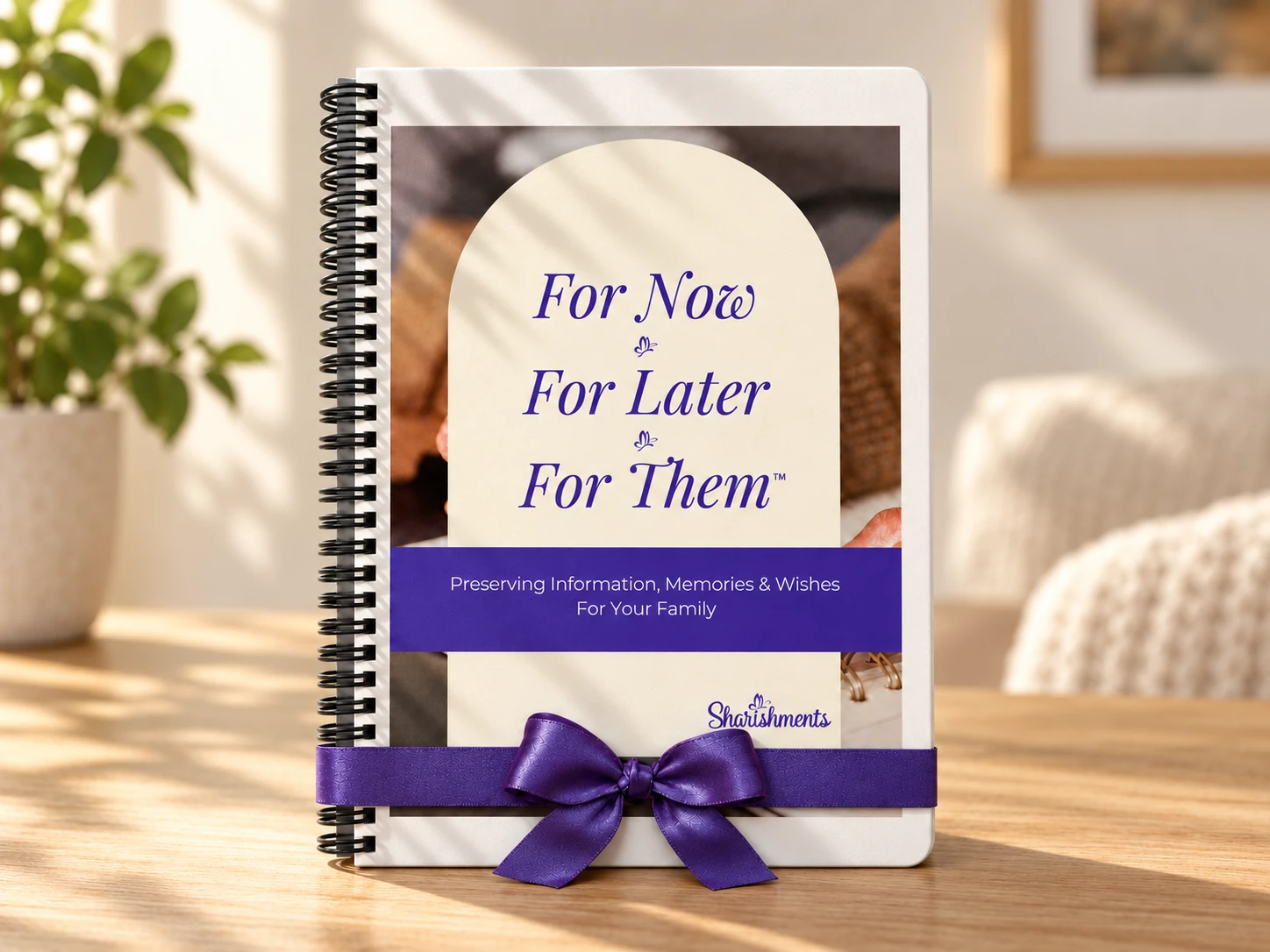Single printed organizer with purple ribbon on an oak table
